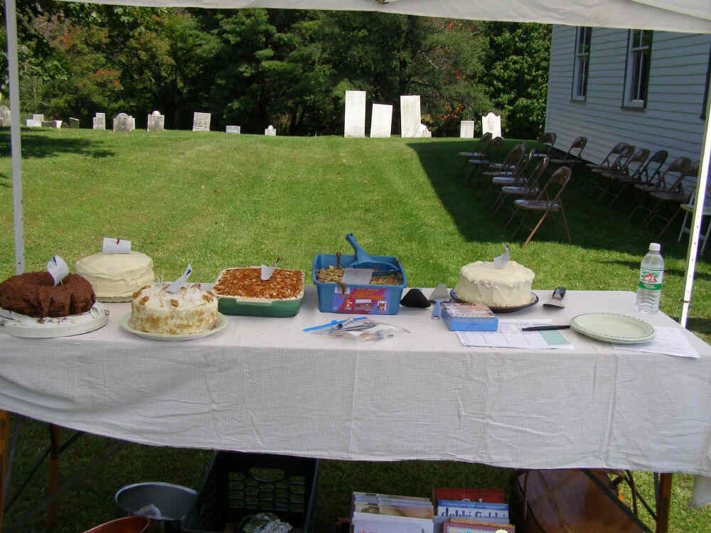 Hopeful entries in the Cake Baking Contest await judging.